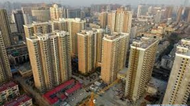 Varias ciudades chinas retiran restricciones a la compra de viviendas para avivar mercado